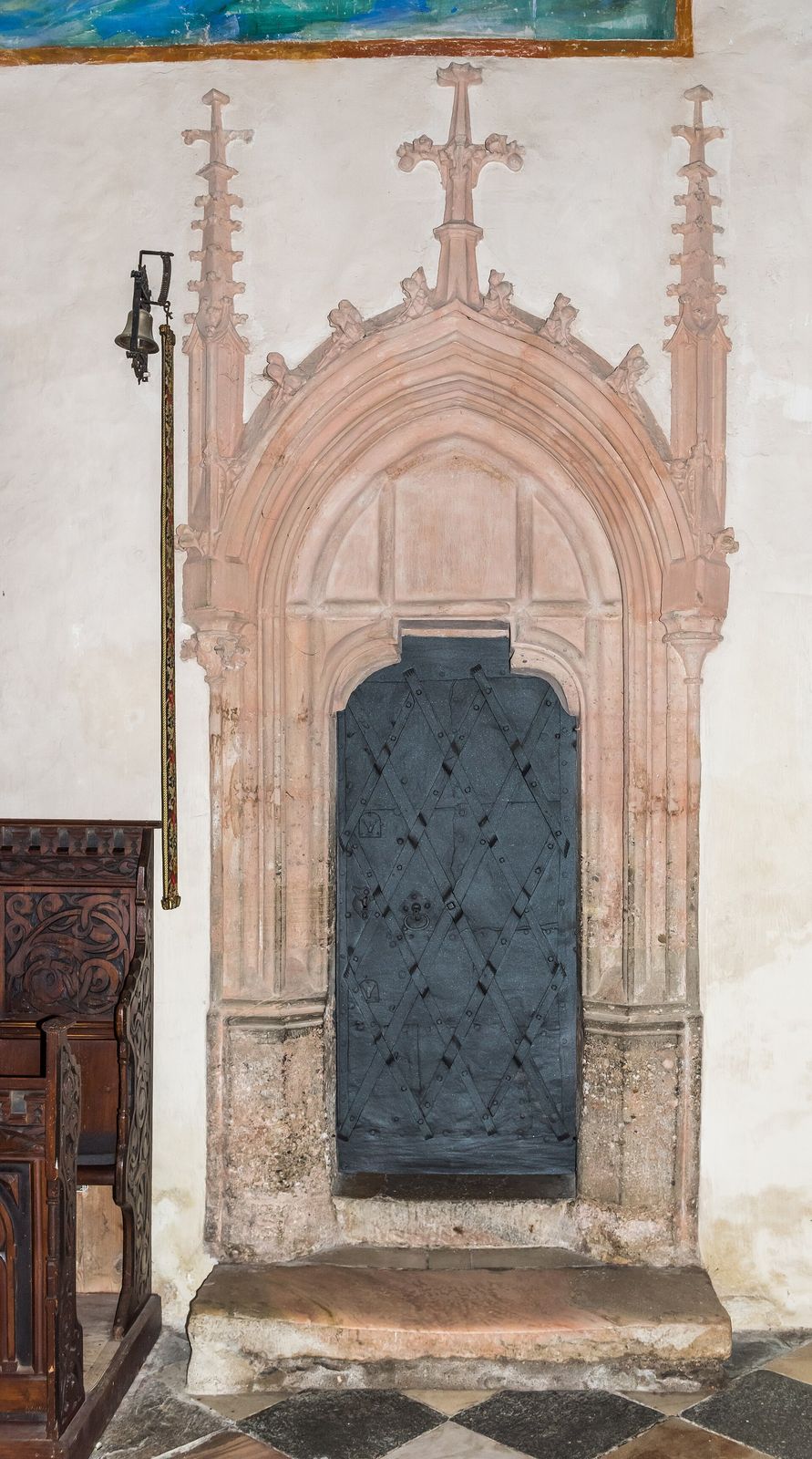 The late-Gothic stone portal and iron-bound sacristy door of the pilgrimage church of Maria Saal, Austria